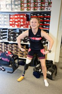 Denise in bike shop. Photo credit: Jeremy Freeman/CNN